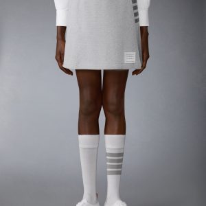 TEXTURED PIQUE 4-BAR BOX PLEAT MINI SKIRT